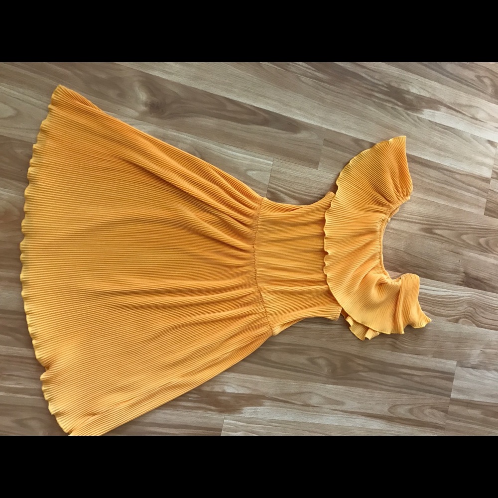 Yellow pleated dress